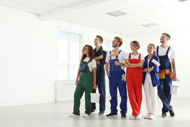 Team of professional painters with tools working royalty free stock photo Team of professional painters with tools working royalty free stock photo