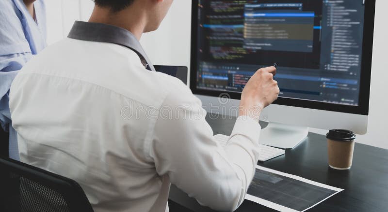 Team of Programmers Working with Computer Programming, Professional ...