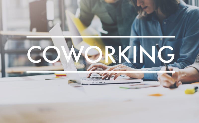 Team succes,coworking world. Photo young business managers work new startup project modern loft. Analyze plans. Contemporary noteboo royalty free stock images