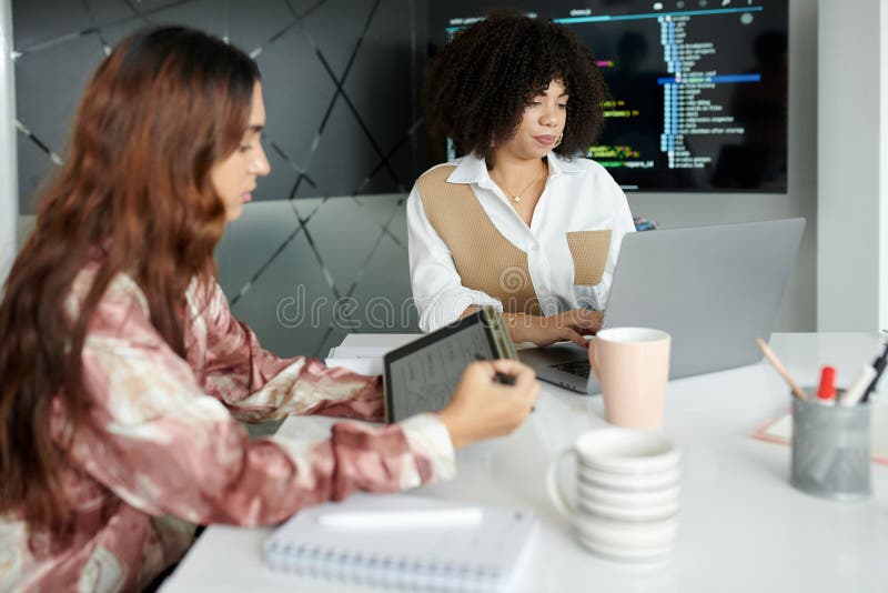 Team of UI and UX Designers Working stock images