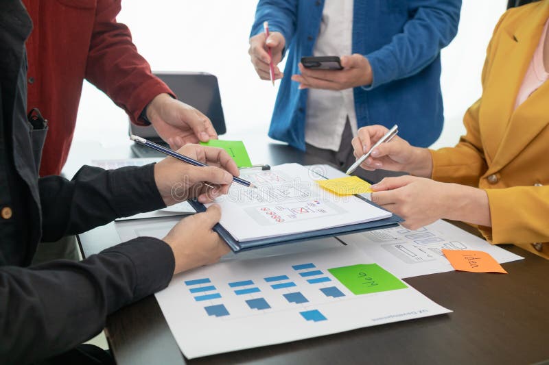 Team of UI UX web designer are working together to develop mobile responsive websites with UI UX front end designer previews, UI UX web development ideas, front end designer. application development