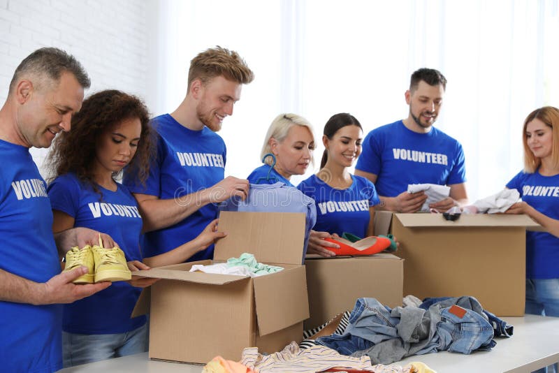 Team of Volunteers Collecting Donations in Boxes Stock Image Image of