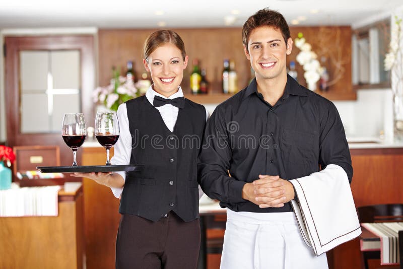 Team of waiter staff in restaurant