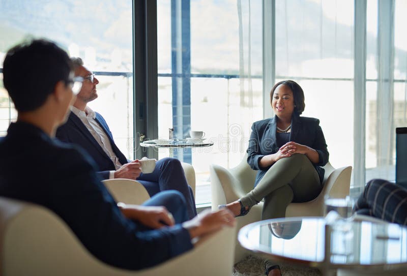 This Team Works because Everyone Contributes. Three Businesspeople