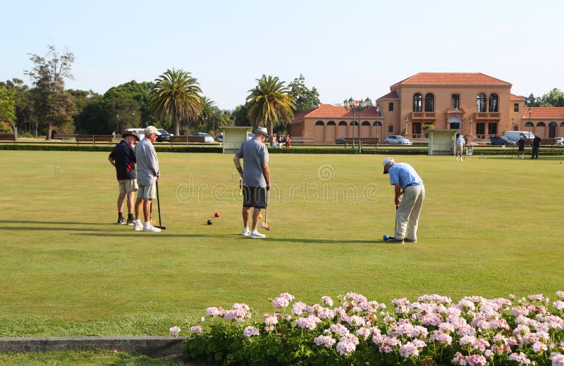 Teams of active senior citizens engaged in a game of lawn bowling at the Rotorua Bowling Club. ROTORUA, NEW ZEALAND - FEBRUARY 3, 2019: Teams of active senior stock photography Teams of active senior citizens engaged in a game of lawn bowling at the Rotorua Bowling Club. ROTORUA, NEW ZEALAND - FEBRUARY 3, 2019: Teams of active senior stock photography