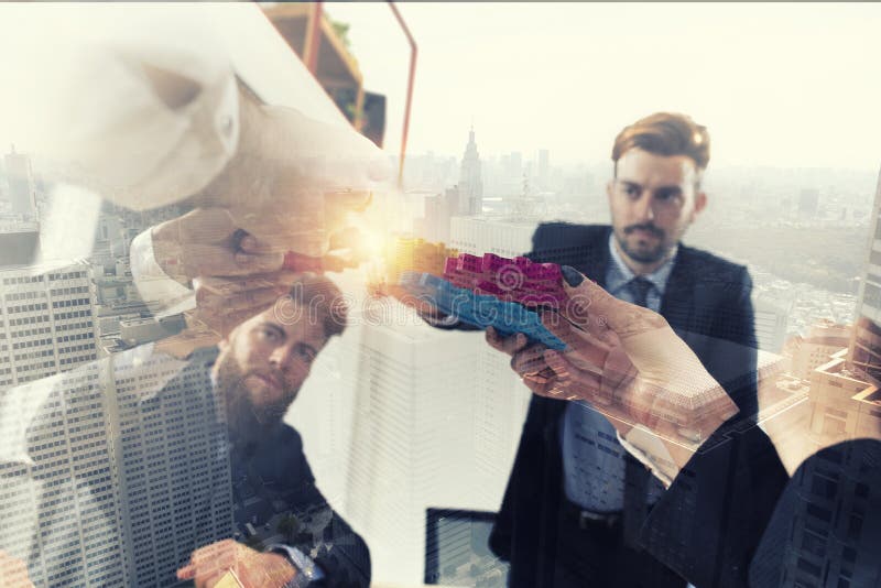 Business team connect pieces of gears. Teamwork, partnership and integration concept. double exposure royalty free stock photo Business team connect pieces of gears. Teamwork, partnership and integration concept. double exposure royalty free stock photo