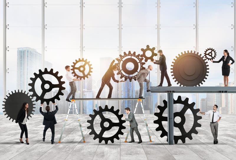 Teamwork of businesspeople work together to a system of gears as integration concept royalty free stock images