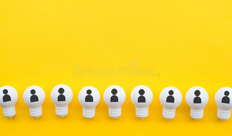 Teamwork concepts with human icon on group of lightbulb on pastel color background. Business solution stock images