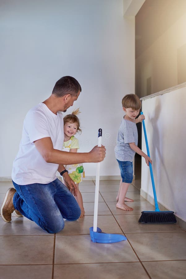 Father Boy Child Sweeping Mess Family Cleaning Together Help Broom Stock  Photo by ©PeopleImages.com 653791010