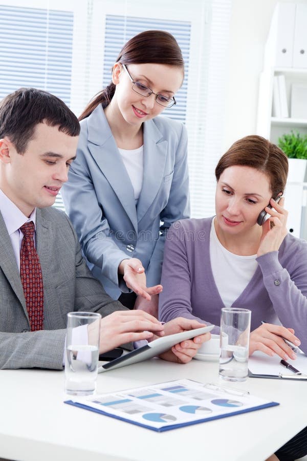 Teamwork in the office stock image. Image of partnership 28552499