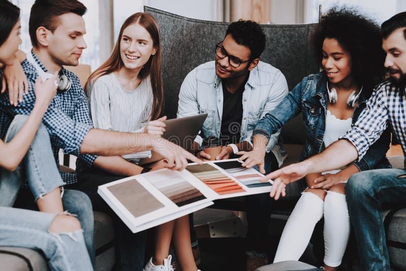 Teamwork. Padded Stools. Look. Young People . stock images Teamwork. Padded Stools. Look. Young People . stock images