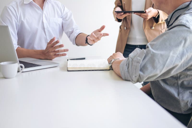 Teamwork process, Business team managers colleagues discussing a stock photography