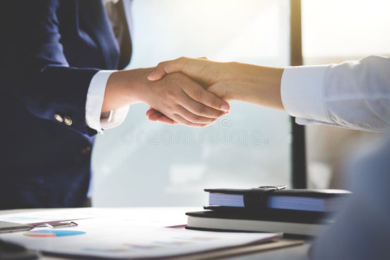 Teamwork process, Image of business team greeting handshake. Successful business people handshaking after good deal, success, dea royalty free stock photo
