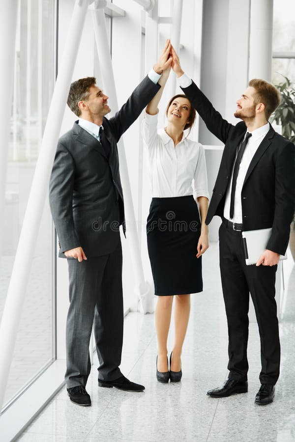 Teamwork. Successful Business People Celebrating a Deal stock images