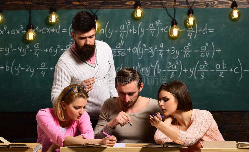Teamwork. teamwork of students working together in school classroom. group of people makes perfect teamwork. teamwork stock image Teamwork. teamwork of students working together in school classroom. group of people makes perfect teamwork. teamwork stock image