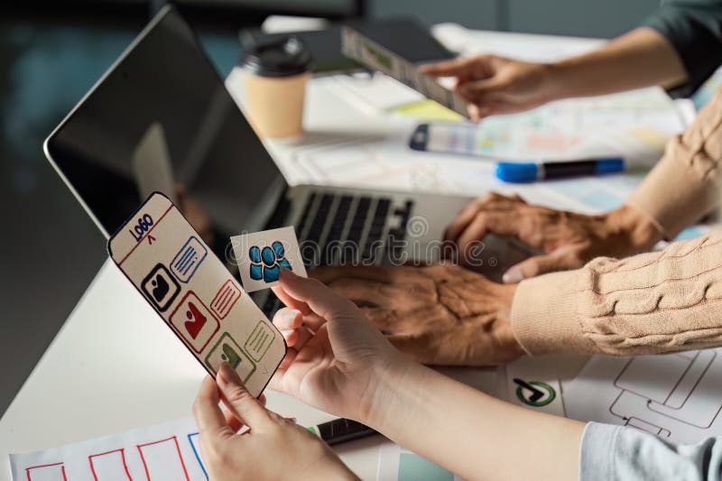 Creative UX UI Design Process with Team Collaboration and Digital Interface Prototypes in Modern Workspace stock photography