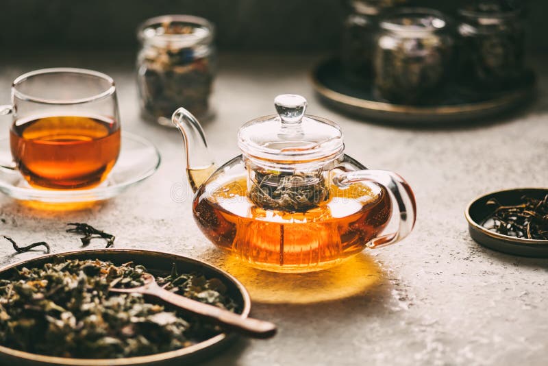 Teapot with Tea and Fresh Leaves Stock Image Image of breakfast, herbs 16790545