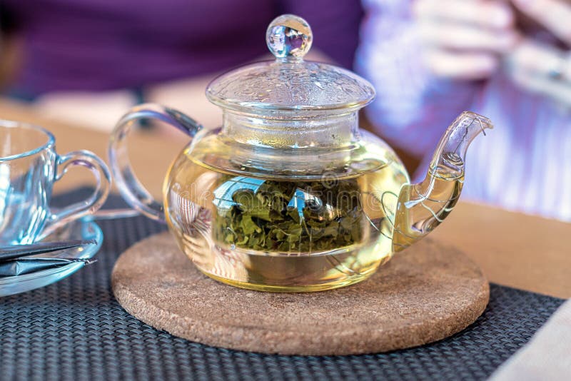Teapot with Herbal Tea. the Concept of Healthy Eating Stock Photo