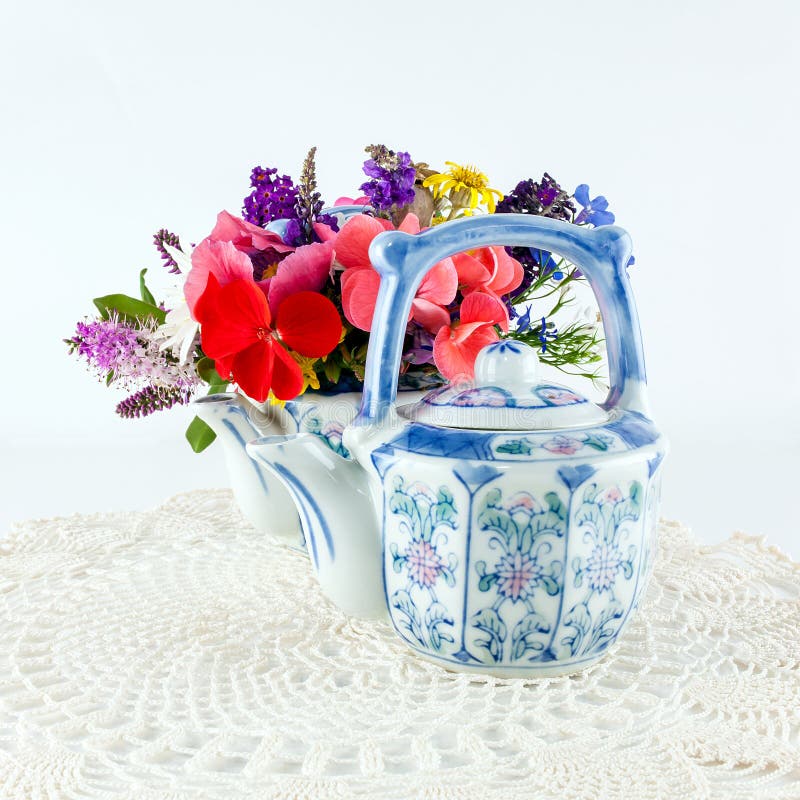 Teapots with flowers