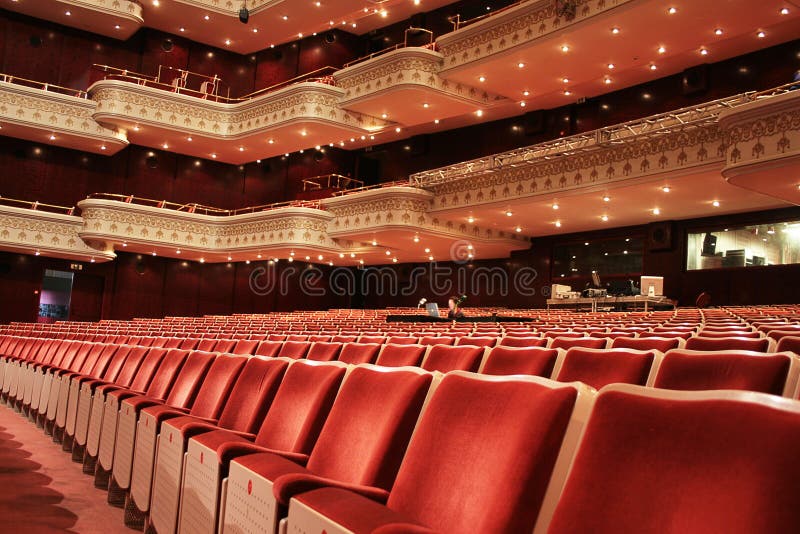 Red velvet seats and balcony in an old theater. Red velvet seats and balcony in an old theater