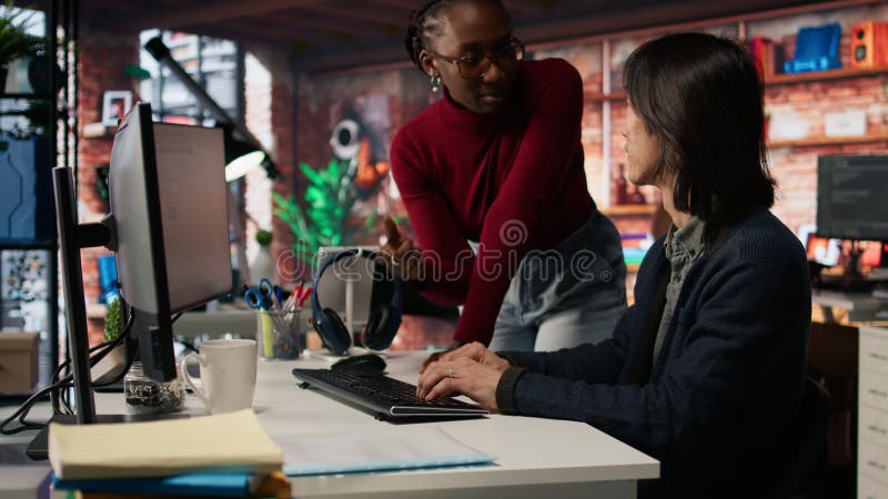 Tech venture company worker requests help from manager stock video footage