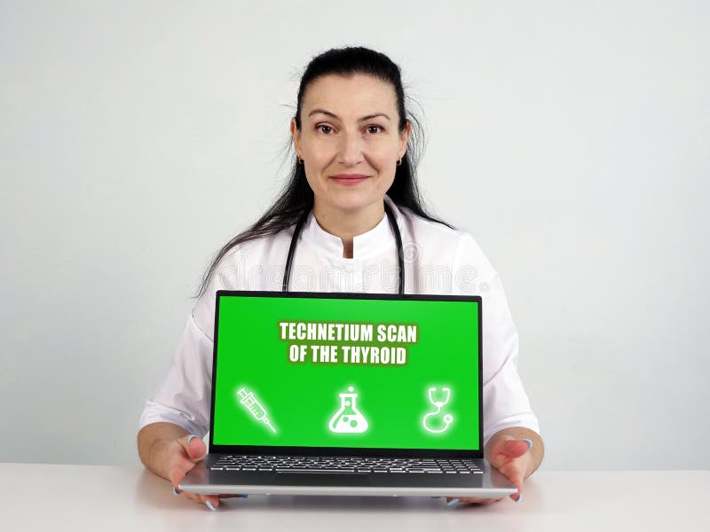 TECHNETIUM SCAN OF THE THYROID inscription on the screen. Close up male hands holding pen stock photography