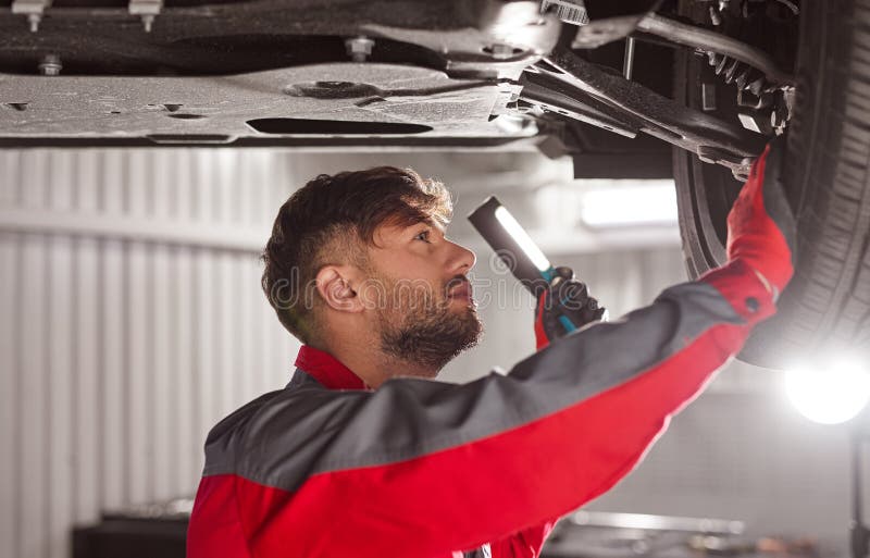 Technician Checking Car Chassis in Stock Image Image of