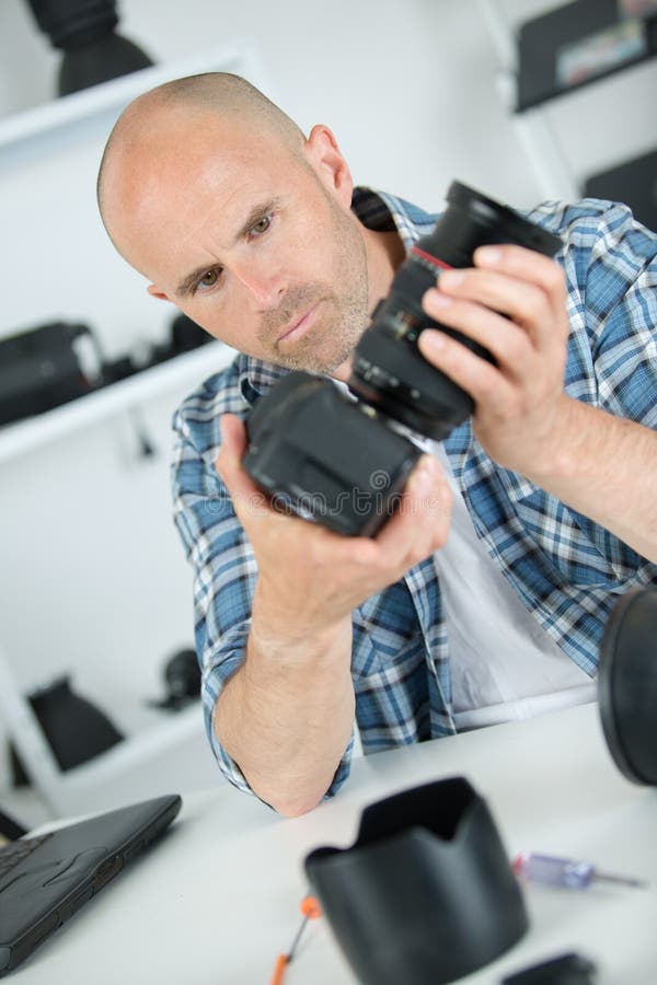 Technician Fitting Camera Lens To Body Stock Image Image of engineer