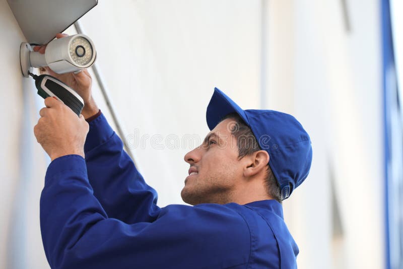 Technician Installing CCTV Camera on Wall Outdoors Stock Image Image