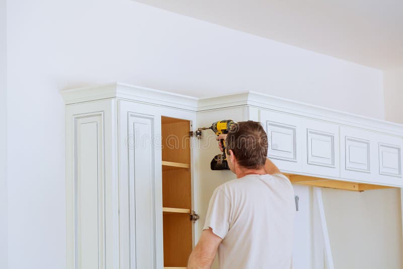 Technician Man Installing Kitchen Cabinets Stock Image Image Of