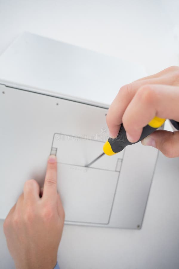 Technician Opening Laptop with Screwdriver Stock Photo Image of
