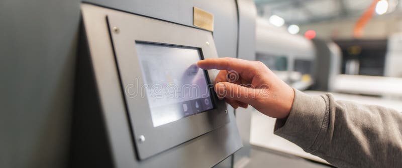 Technician operator checking status on touchscreen front display monitor station royalty free stock photos