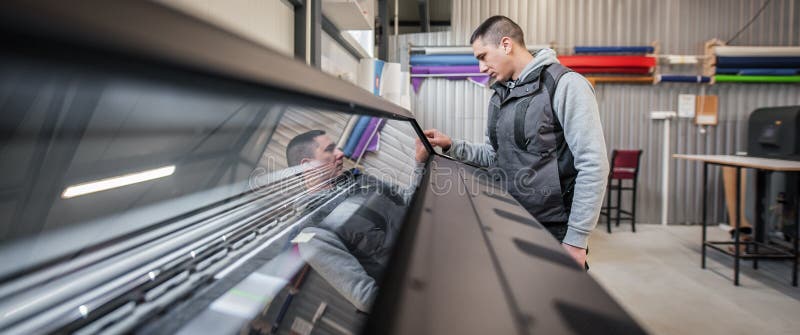 Technician operator checking status on touchscreen front display monitor station royalty free stock photos