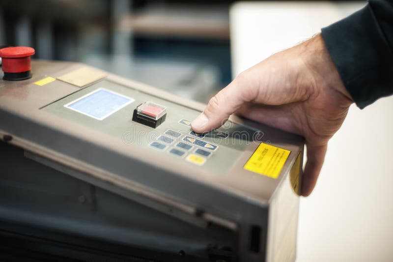 Technician operator checking status on touchscreen front display monitor station stock photo