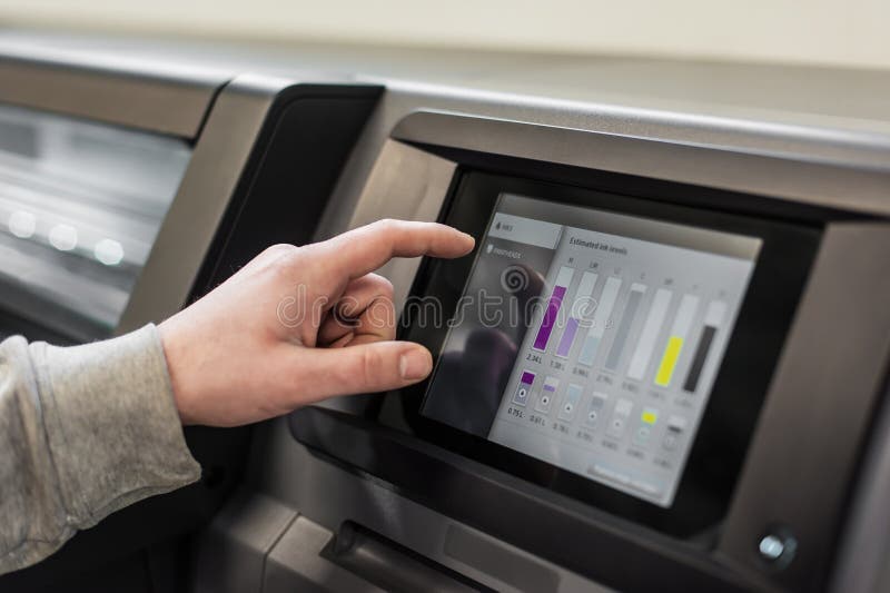 Technician operator checking status on touchscreen front display monitor station royalty free stock photography