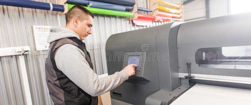 Technician operator checking status on touchscreen front display monitor station stock photography