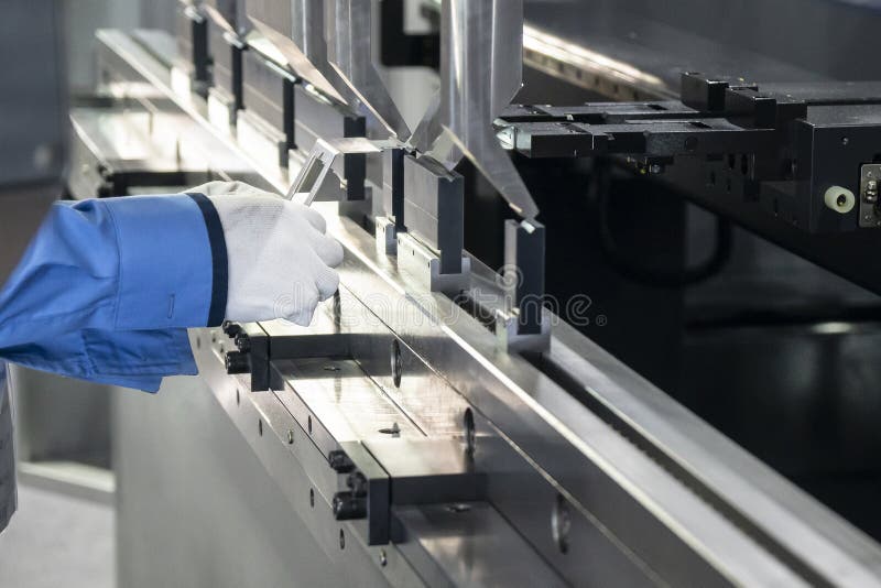 The Technician Operator Use Hydraulic Bending Machine. Stock Image