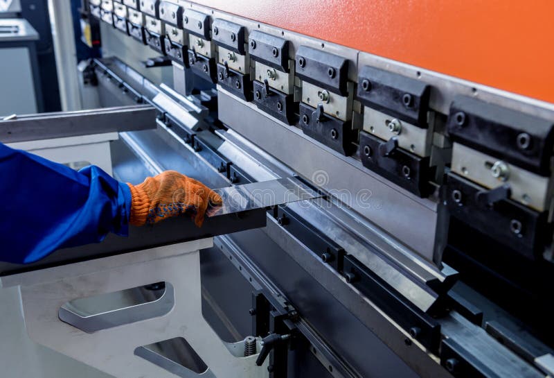 The Technician Operator Use Hydraulic Bending Machine. Stock Photo