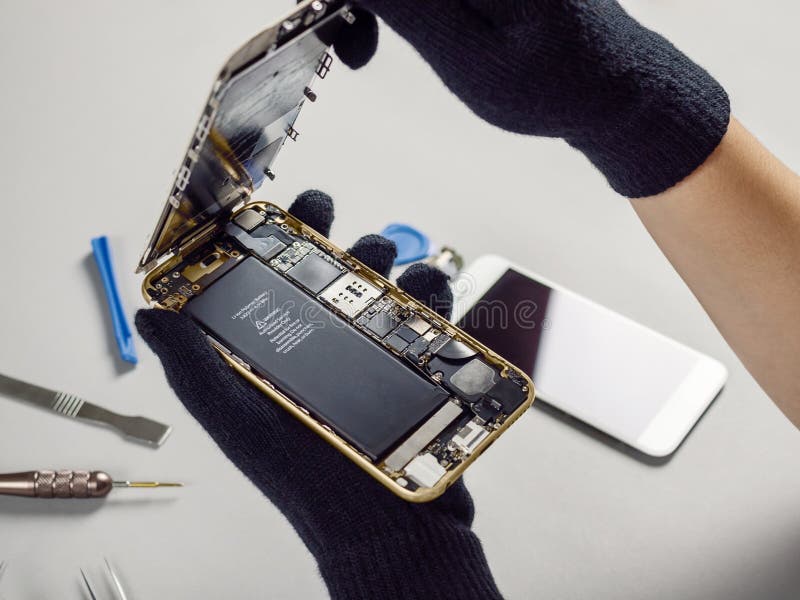 Technician Repairing Broken Smartphone on Desk Stock Photo Image of
