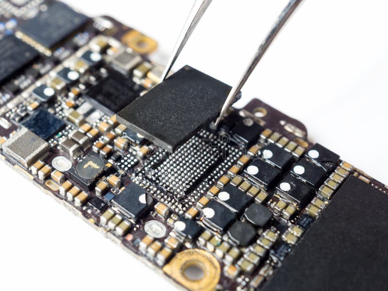 Technician Replacing Power IC of Smartphone Motherboard Stock Image