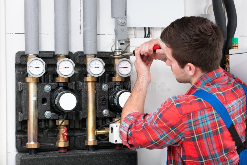 Heating Engineer in a Boiler Room for Heating Stock Image Image of