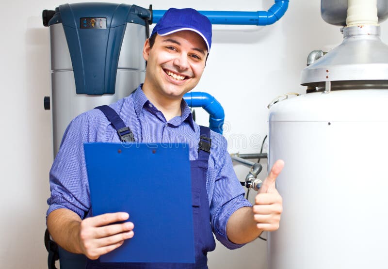 Technician Repairing an Hotwater Heater Stock Image Image of pipe
