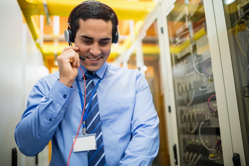Technician talking on head phones Stock Image Everypixel
