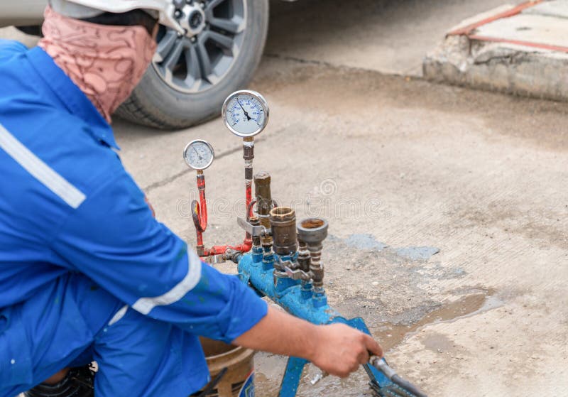 Technician Use Nitrogen Compressor To Inspector Function Safety Valve