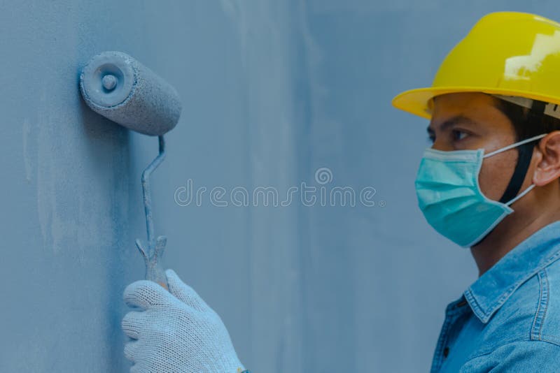 Technician Using Paint Roller Stock Image Image of color, equipment