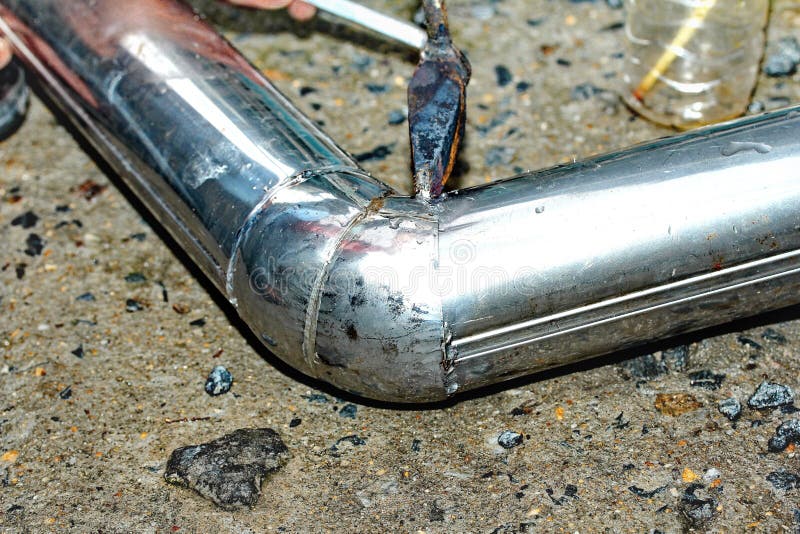 Technician is Welding Aluminium Pipe by Using Soldering Copper. Stock