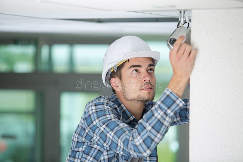 513 Technician Worker Installing Video Surveillance Camera Wall Stock