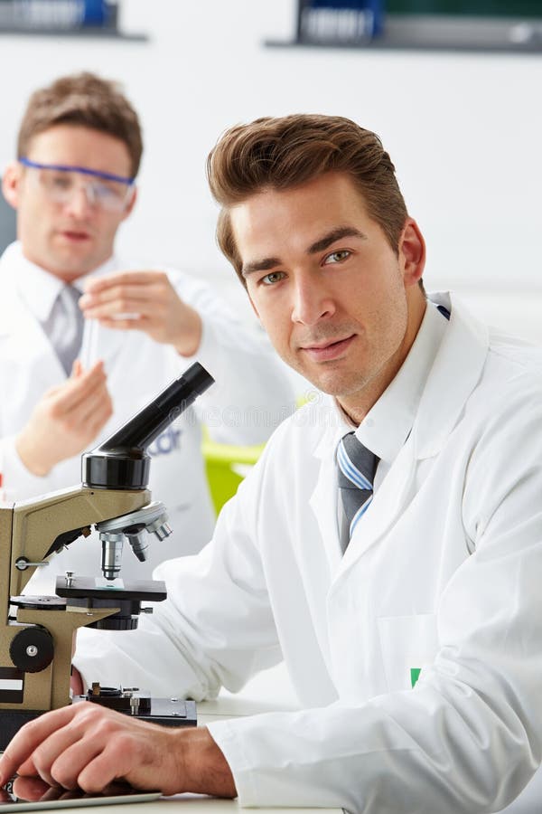 Technicians Carrying Out Research In Laboratory royalty free stock photography Technicians Carrying Out Research In Laboratory royalty free stock photography