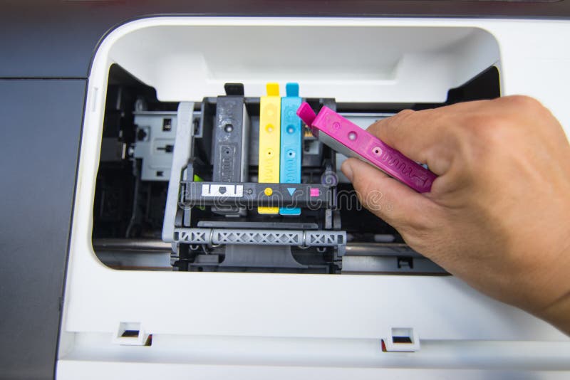 Technicians are Install Setup the Ink Cartridge of a Inkjet Printer the