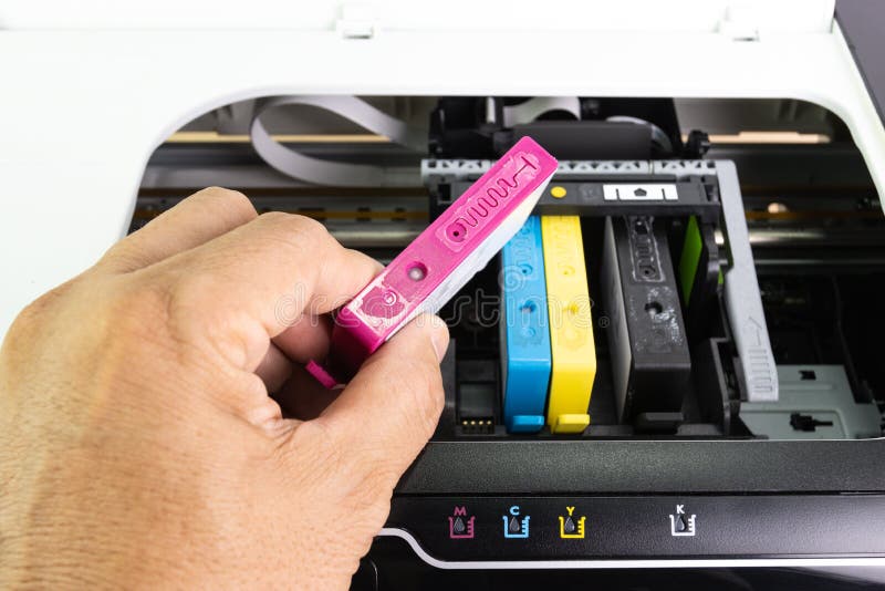 Technicians are Install Setup the Ink Cartridge of a Inkjet Printer the